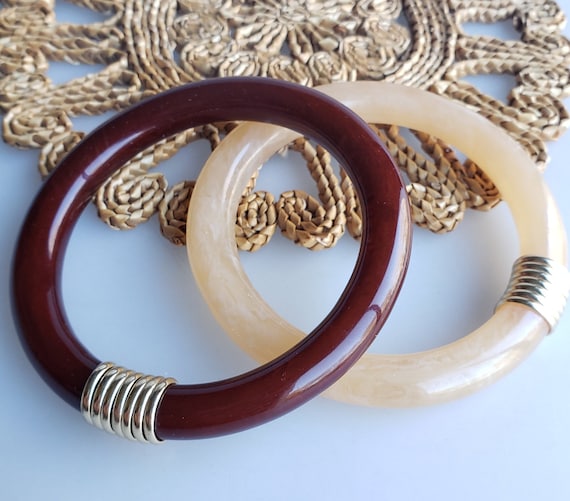 Pair of lucite bangle bracelets wire wrap trim da… - image 1