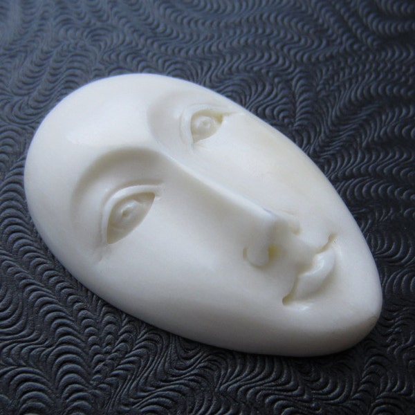 Hand Carved  Oval Face,  30 mm x 21 mm, Buffalo bone carving  G131