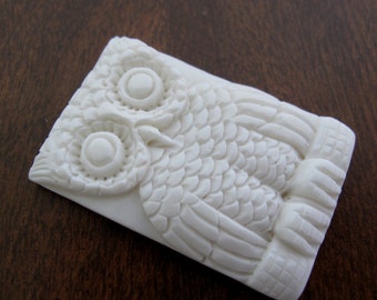 Carved owl from water buffalo G513