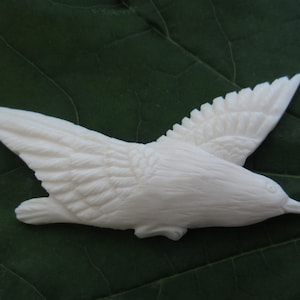 Carved bone flying Raven, Jewelry Supplies G227