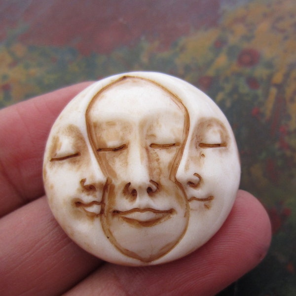 Buffalo bone carving, three  face  cabochon G040