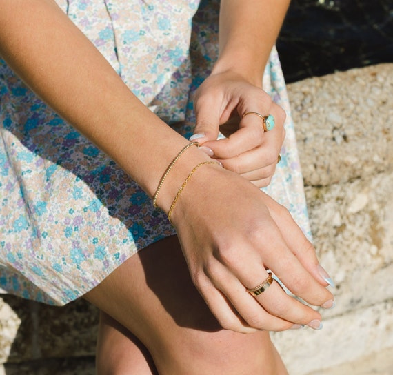 gold dress bracelets The Pearlescent Link Toggle Bracelet main image 1