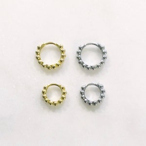 Mini dotted huggie hoops image 1