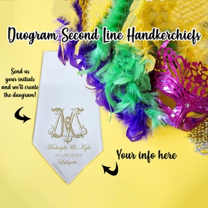 May include: White handkerchief with gold embroidered initials "M & K" and the text "Makayla & Kyle 10.28.2023 Lafayette". The handkerchief is surrounded by purple, green, and gold Mardi Gras feathers and a pink mask.