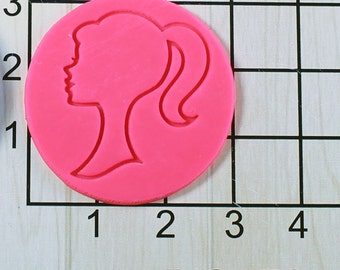 barbie figurine stamper with complan