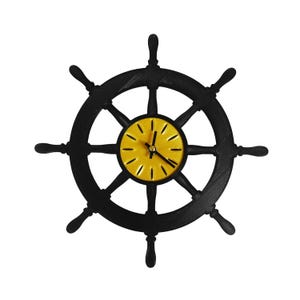 May include: A black ship's wheel clock with a yellow clock face. The clock hands are black, and the clock face has black markings. The wheel has eight spokes and eight handles. The clock is a nautical-themed decorative item.