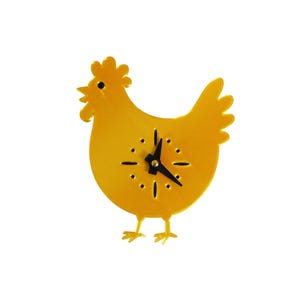 May include: A yellow chicken-shaped wall clock with black clock hands and a black clock face. The clock has a decorative design with a rooster's comb and tail feathers. The clock is made of a solid material and has a simple, modern design.