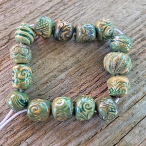 Set of 15 Handmade Green Ceramic Beads – Glazed, Unique, and Artisan-Crafted