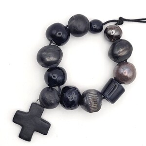 Set of 12 Handmade Black Ceramic Beads, and Greek Cross Ceramic Pendant – Glazed, Unique, and Artisan-Crafted