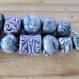 Set of 12 Handmade Blue Ceramic Beads – Glazed, Unique, and Artisan-Crafted