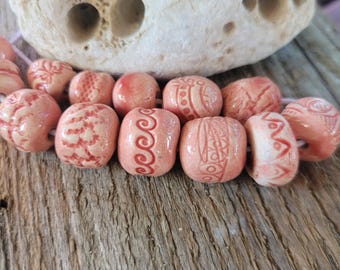 Handmade Pink Ceramic Beads – Glazed, Unique, and Artisan-Crafted Set of 12