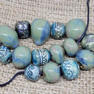 Set of 15 Handmade Blue Ceramic Beads – Glazed, Unique, and Artisan-Crafted