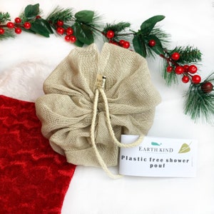 plastic free shower pouf great as a stocking filler for christmas gifts. machine washable and sustainable. made with cotton linen and includes a rope for hanging. Soft- medium feel.