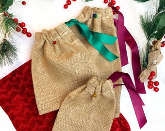 Jute reusable gift bags. Eco Stocking stuffer. Hessian tote gift wrapping closed with ribbon and a bell. Plastic free fabric present wrap