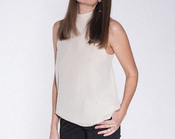 Silk top with stand-up collar in cream