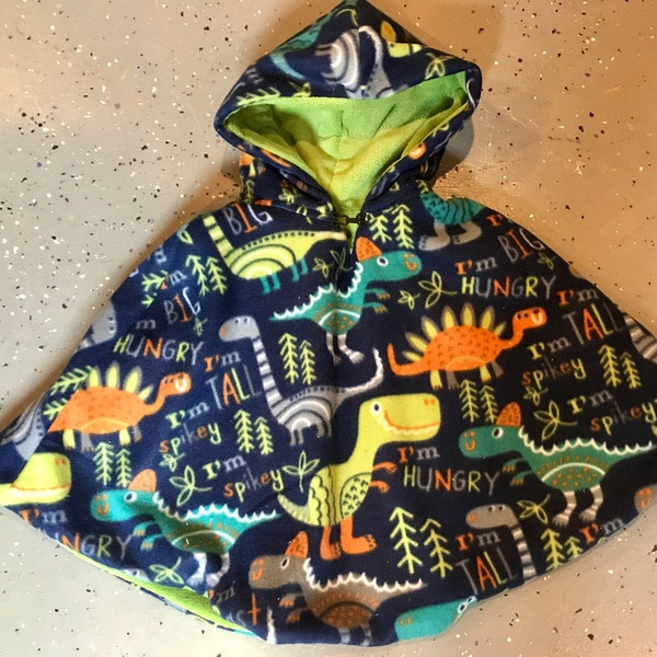 Dinosaur car seat poncho with navy lining.  Sold out of green lining