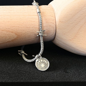 Silver Barbed Wire Bracelet With Moon Phase Charm