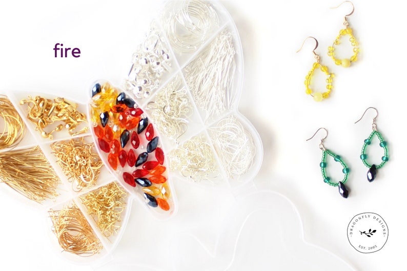 May include: A butterfly-shaped organizer filled with jewelry-making supplies, including gold and silver wires, beads, and earring hooks. Two pairs of beaded teardrop earrings in yellow and green are displayed. The word "fire" is visible.