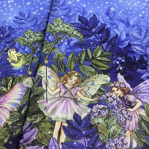 May include: Two rectangular fabric panels featuring a vibrant print of fairies with translucent wings in a lush garden. The design includes deep purple and blue foliage, blooming flowers, and a starry night sky background with golden star accents.