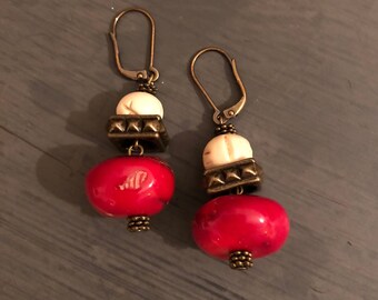 Red Coral Beads with carved bone and bronze metal accent earrings.