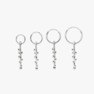Minimalistic hoop earring with Barnacle Boy pendant | Price per piece or pair | Sterling silver