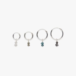Minimalistic silver hoop earring with rough diamond charm | Raw genuine white, blue, and black diamond | Per piece or per pair | Sterling