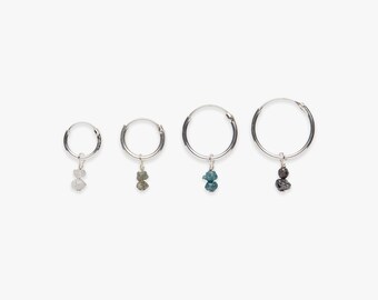 Minimalistic silver hoop earring with rough diamond charm | Raw genuine white, blue, and black diamond | Per piece or per pair | Sterling