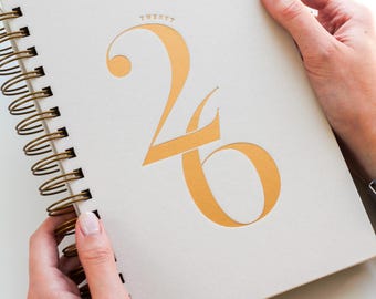 Agenda y planificador 2026 / Vista semanal A5 / Planificador semanal 2026 con resumen anual, páginas mensuales y semanales / Encuadernación en espiral minimalista