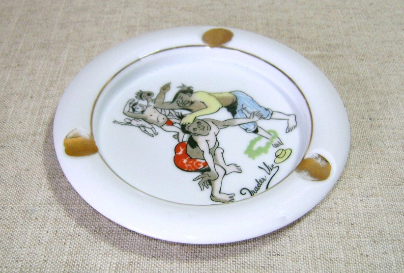 Vintage Trader Vic\u2019s Porcelain Ashtray Made in Japan circa 1960s with Polynesian Cartoon Rendering