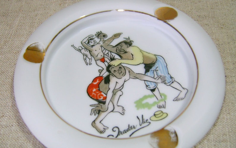 Vintage Trader Vic\u2019s Porcelain Ashtray Made in Japan circa 1960s with Polynesian Cartoon Rendering