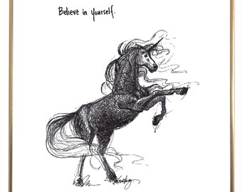 May include: Black and white line drawing of a unicorn rearing up with its mane flowing in the wind. The drawing is framed in a gold frame and the text "Believe in yourself." is written above the unicorn.