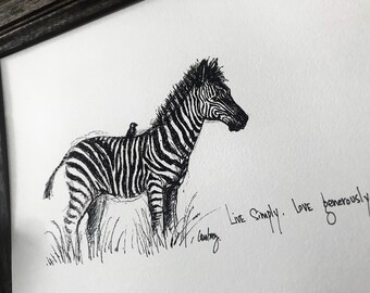 May include: Black and white ink drawing of a zebra with a small bird perched on its back. The zebra is standing in tall grass. The drawing is signed "Courtney" and includes the text "Live Simply. Love generously."