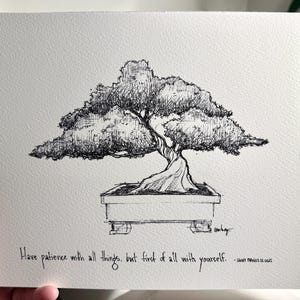 May include: Black and white ink drawing of a bonsai tree in a pot. The quote "Have patience with all things, but first of all with yourself." is written below the tree.