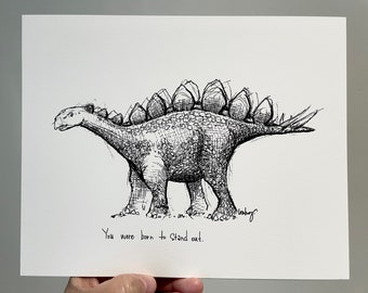 May include: Black and white ink drawing of a Stegosaurus dinosaur with the text "You were born to stand out."