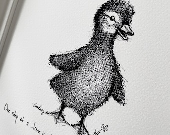 May include: Black and white ink drawing of a baby duckling with the quote "One step at a time is all it takes to get you there."