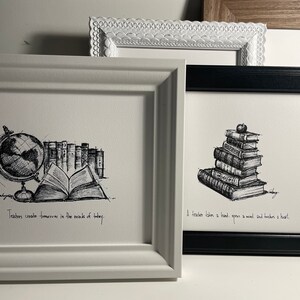 May include: Two framed black and white ink drawings. The first drawing depicts a globe, a stack of books, and an open book with the text "Teachers create tomorrows in the minds of today." The second drawing depicts a stack of books with an apple on top and the text "A teacher takes a hand, opens a mind and touches a heart."
