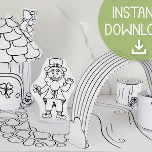 Puede incluir: Un juego de manualidades de papel en blanco y negro para el Día de San Patricio. El juego incluye una casa, un duende, un arcoíris y una olla de oro. Las palabras "DESCARGA INSTANTÁNEA" están en un círculo verde. La manualidad está diseñada para colorear.