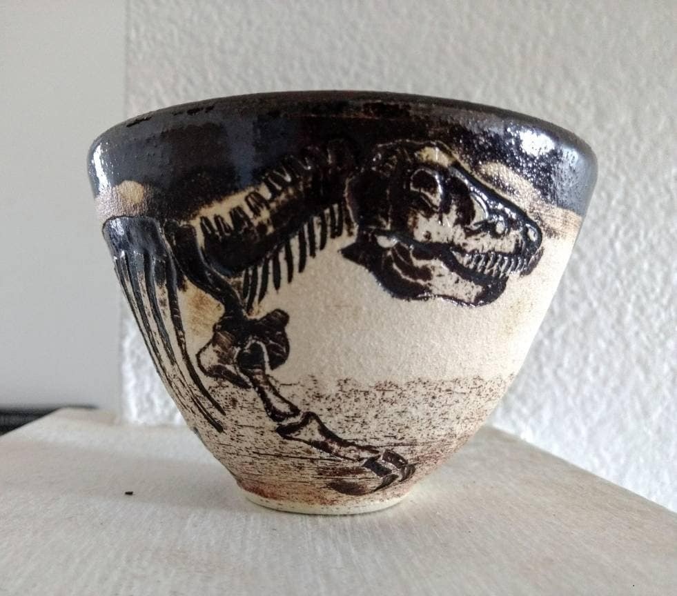dinosaur with bowl head