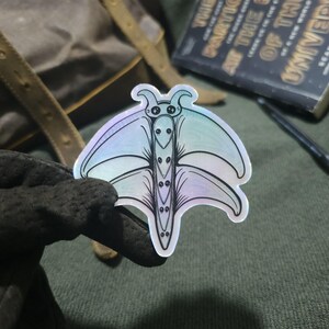 Air Rod Cryptid Holographic Sticker | Kawaii Atmospheric Beast - Water ...