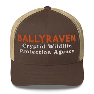 Cryptid Wildlife Protection Agency Trucker Cap