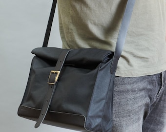 Black roll top shoulder bag. Small minimalist bag. Waxed canvas and leather shoulder bag. Waterproof cross body purse. Everyday purse.