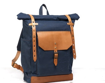 Blue waxed canvas and leather backpack for work. Roll top daypack. Customizable sustainable rucksack. Personalized water resistant bag.