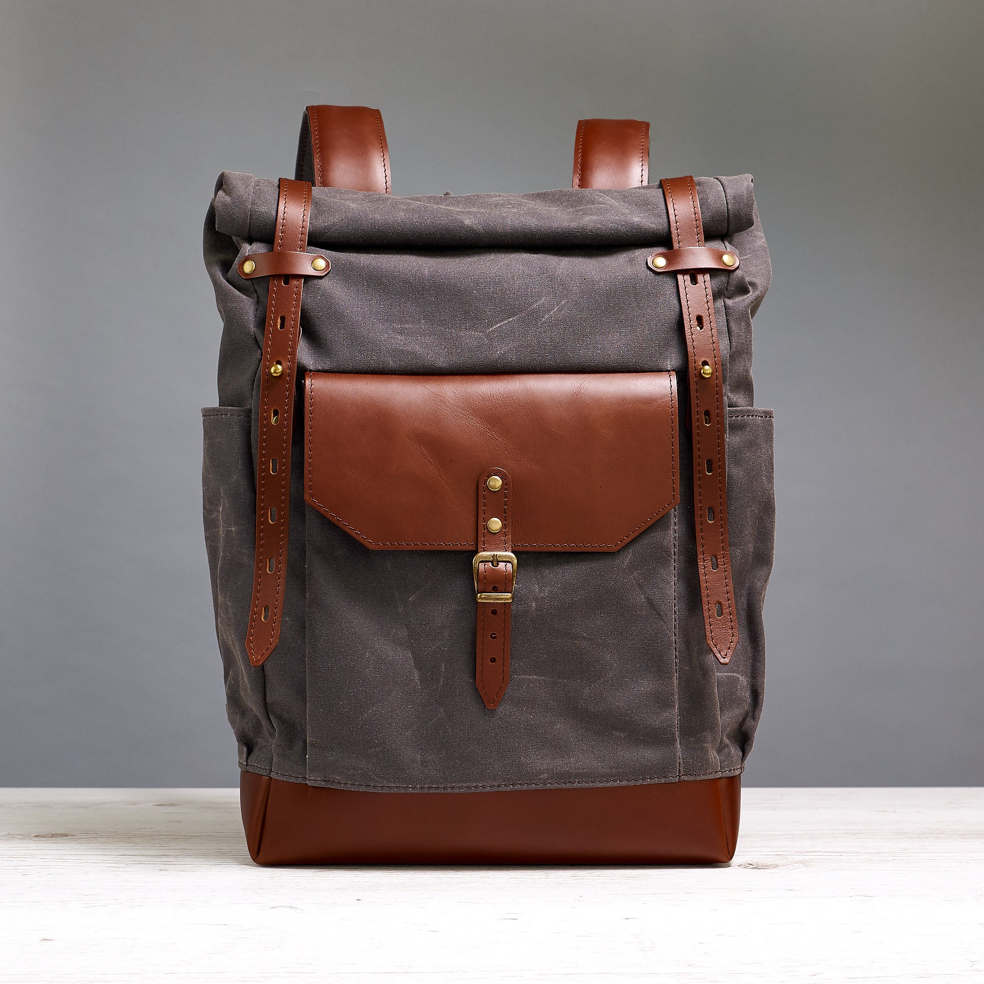 Roll top canvas backpack for 15 inch laptop. Dark chocolate colour.