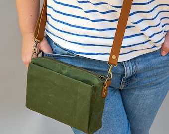 Small zippered waxed canvas crossbody bag. Green canvas purse zip pocket.