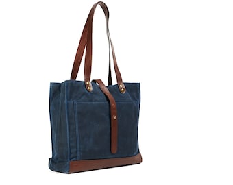 Small tote bag in navy blue / cognac. | Waxed canvas bag. Leather handles, key chain