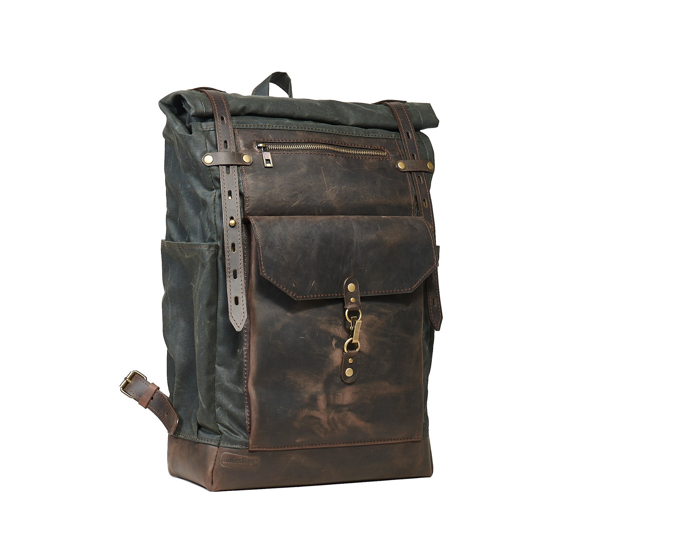 Dark green wax canvas rolltop rucksack. Laptop backpack.
