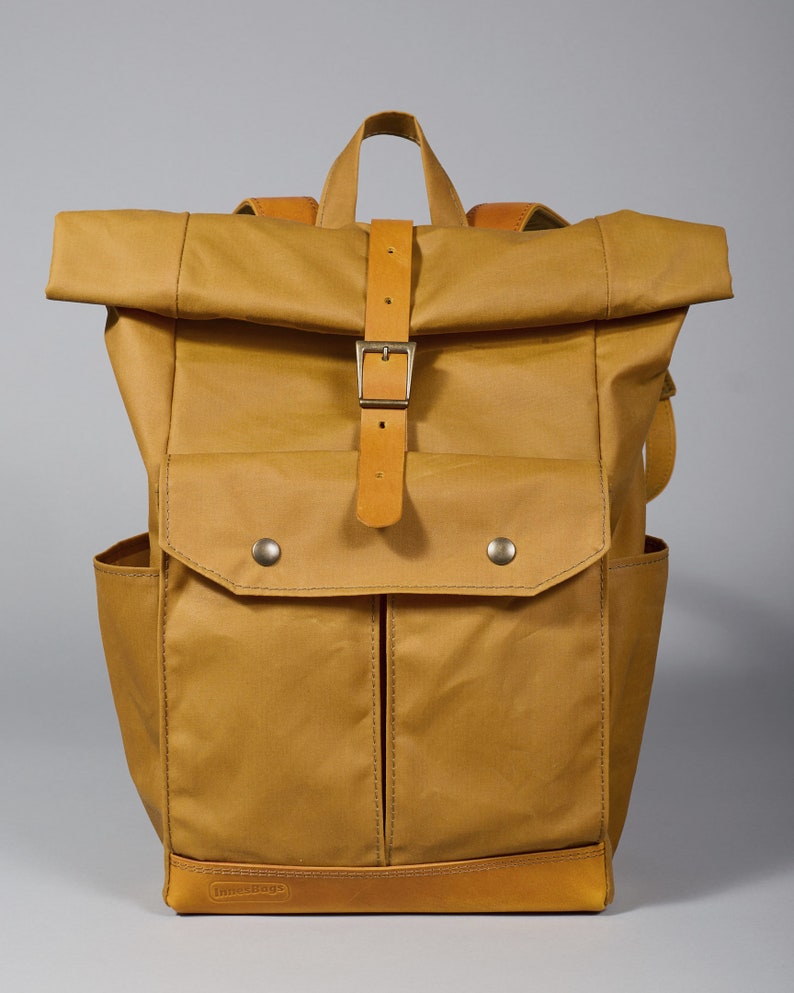 Yellow carry-on backpack with five pockets and padded section for 13 laptop. Personalized Waxed canvas rolltop backpack. Free engraving image 3