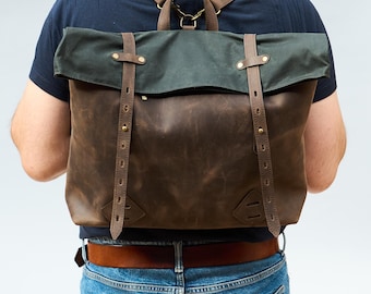 Leather convertible backpack / messenger bag. Waterproof laptop bag. Leather and waxed canvas roll top backpack. Rugged crossbody bag.