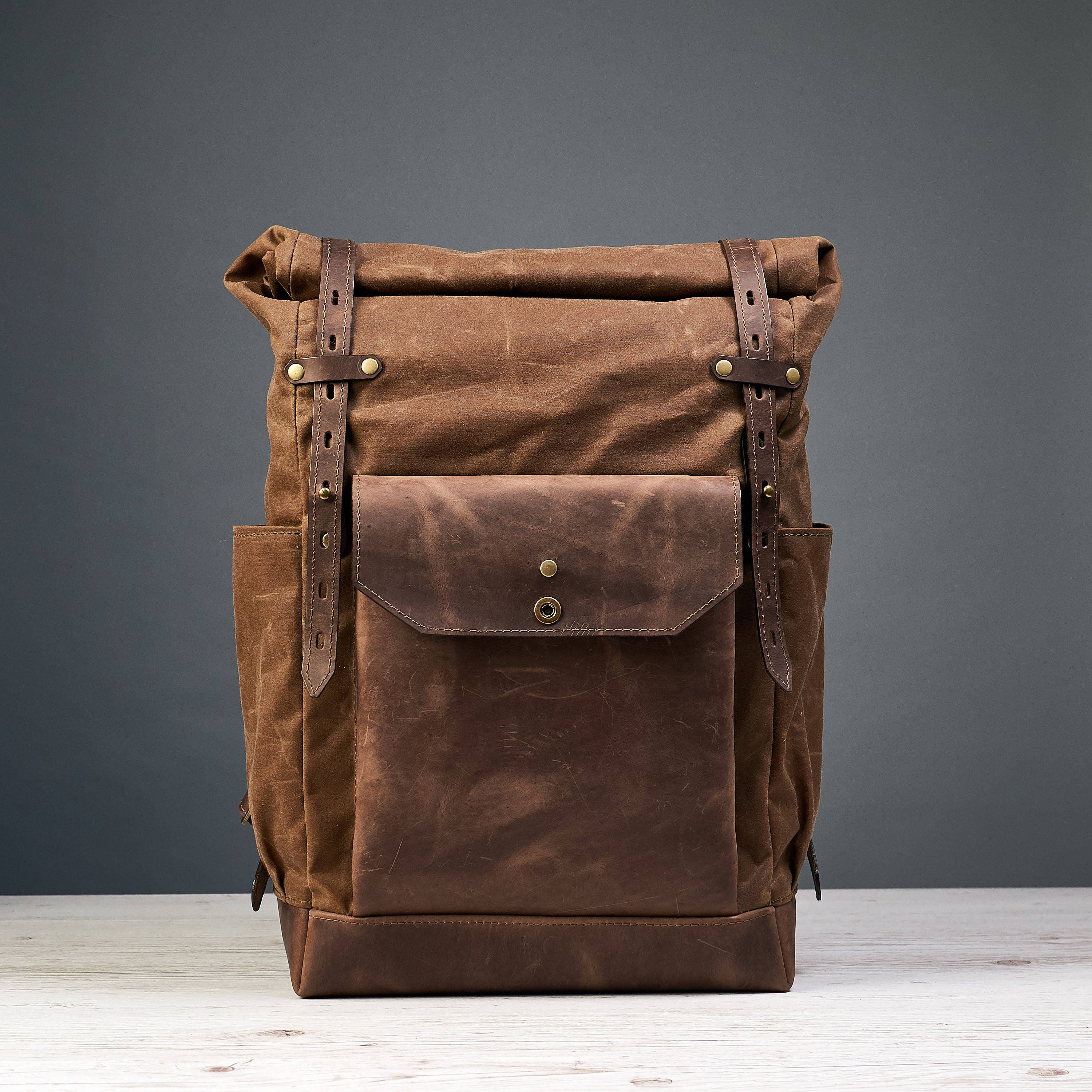 Brown waxed canvas leather backpack. Travel bag.