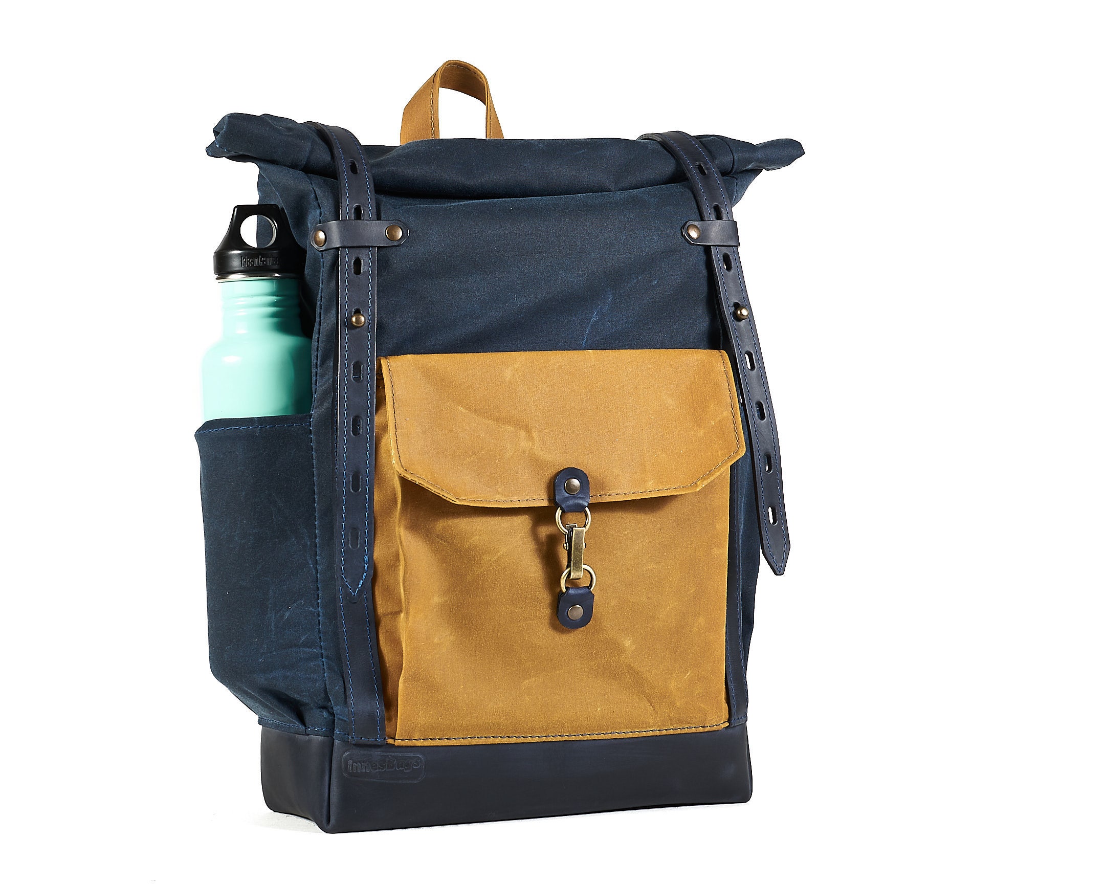 Roll top waxed canvas leather backpack in Navy blue Yellow